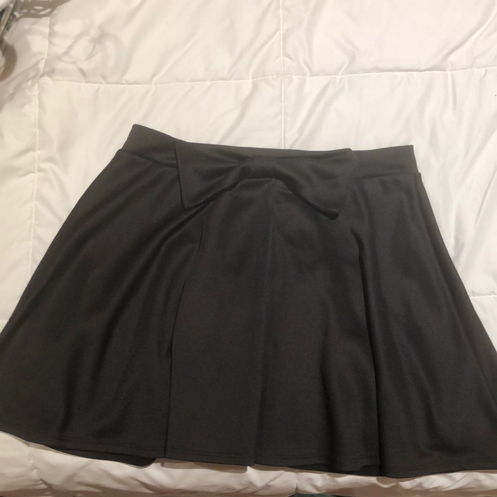 Black circle mini skirt